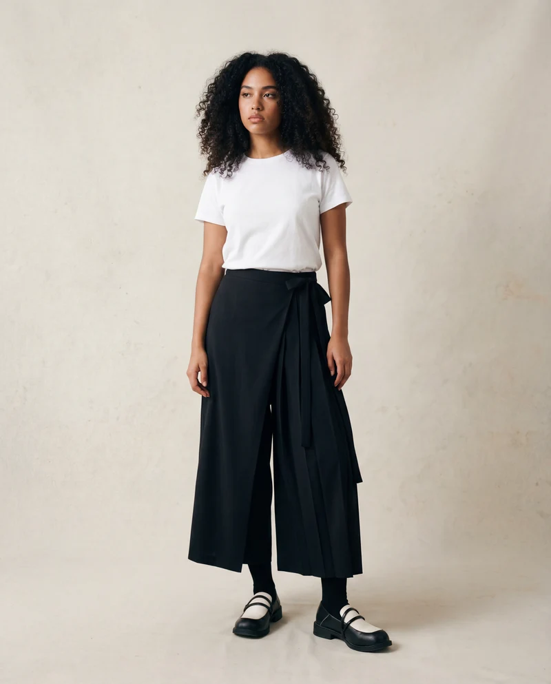 Black Skirt-Pant Hybrid with Pleated Overlay – Edgy and Unique Design for Modern Styles