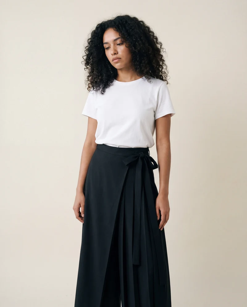 Black Skirt-Pant Hybrid with Pleated Overlay – Edgy and Unique Design for Modern Styles