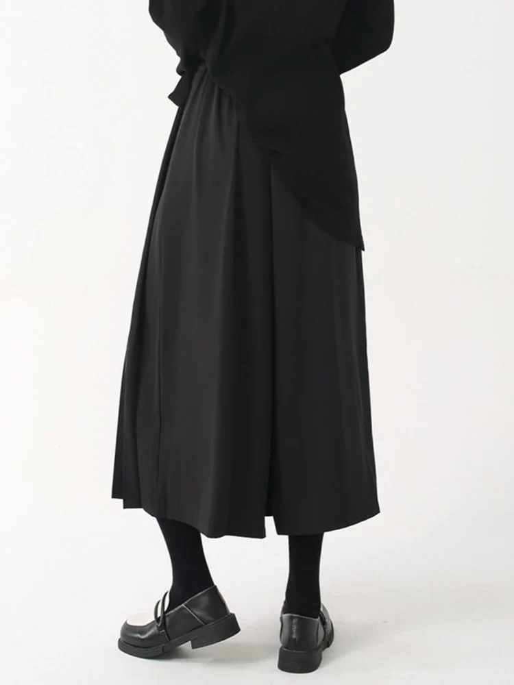 Black Skirt-Pant Hybrid with Pleated Overlay – Edgy and Unique Design for Modern Styles