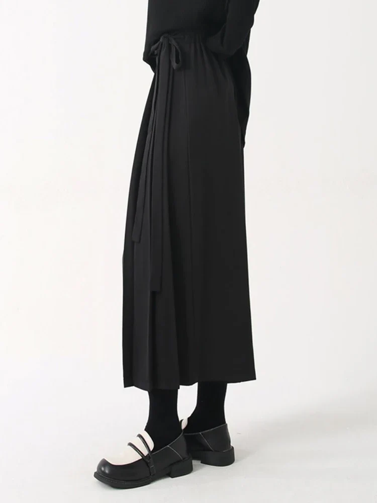 Black Skirt-Pant Hybrid with Pleated Overlay – Edgy and Unique Design for Modern Styles