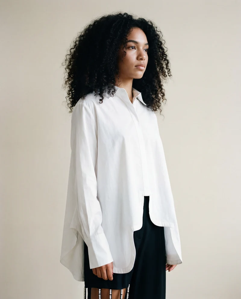 Asymmetrical Hem White Blouse with Unique Cut