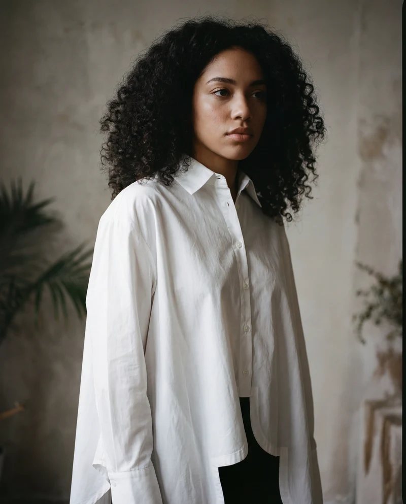 Asymmetrical Hem White Blouse with Unique Cut