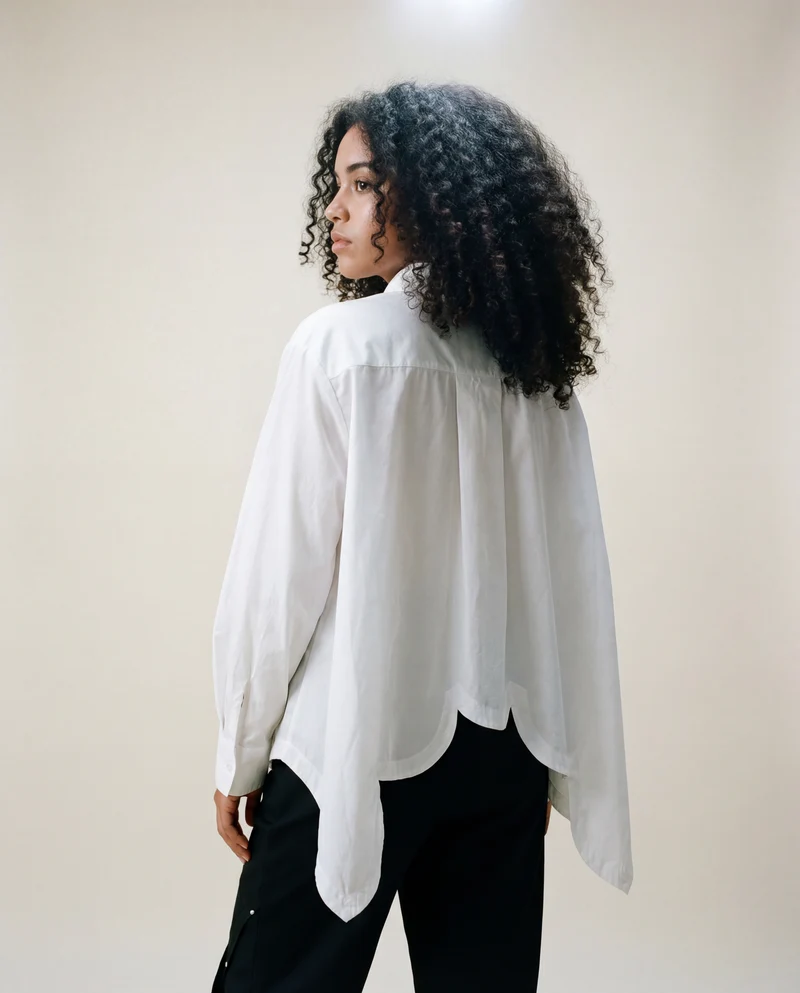 Asymmetrical Hem White Blouse with Unique Cut