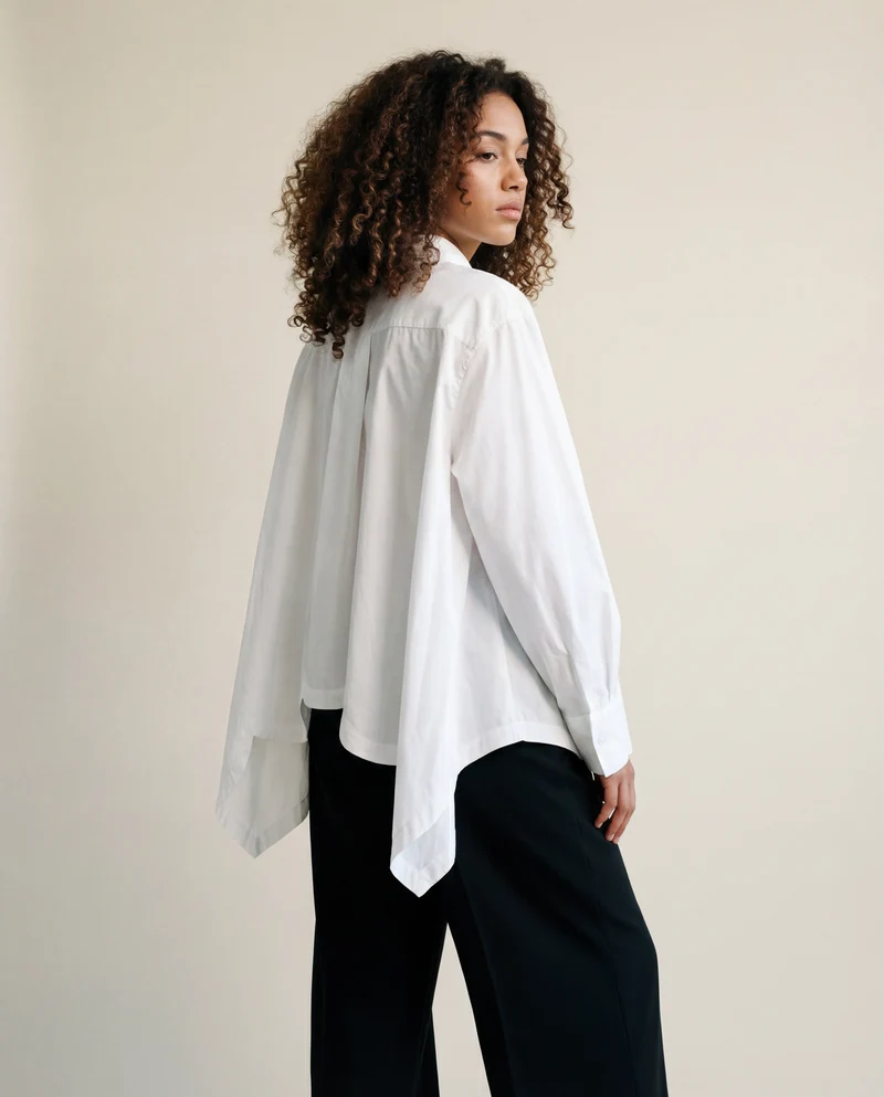 Asymmetrical Hem White Blouse with Unique Cut