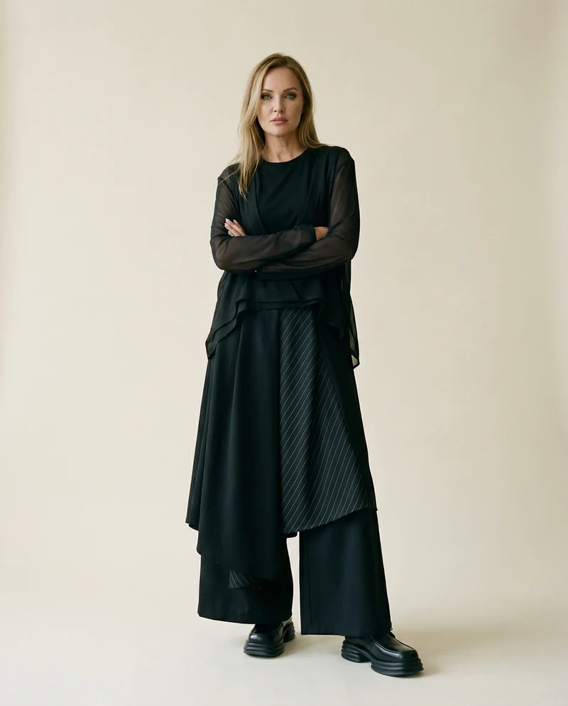 Edgy Elegance: Mesh Turtleneck & Asymmetrical Vest Set