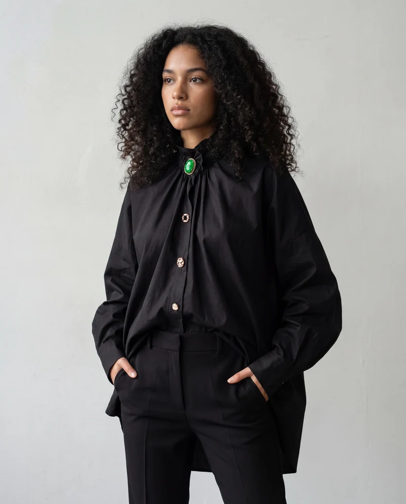 Ruffled Blouse with Decorative Buttons