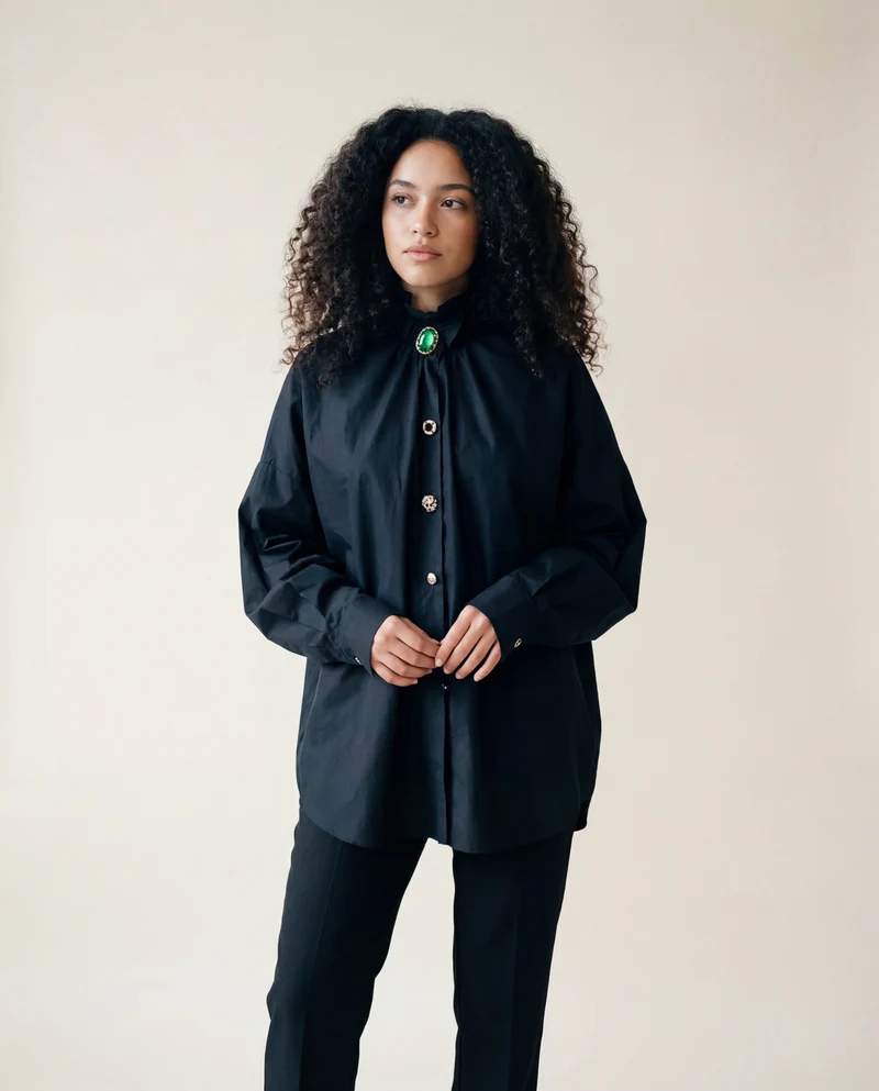 Ruffled Blouse with Decorative Buttons