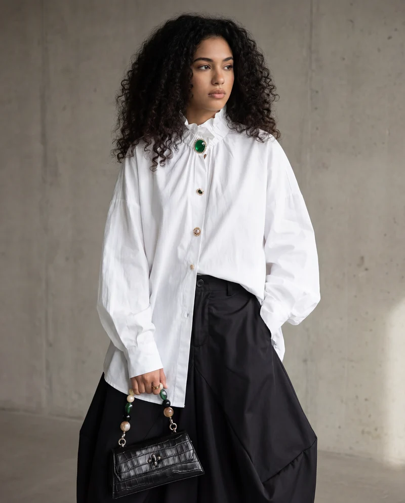 Ruffled Blouse with Decorative Buttons