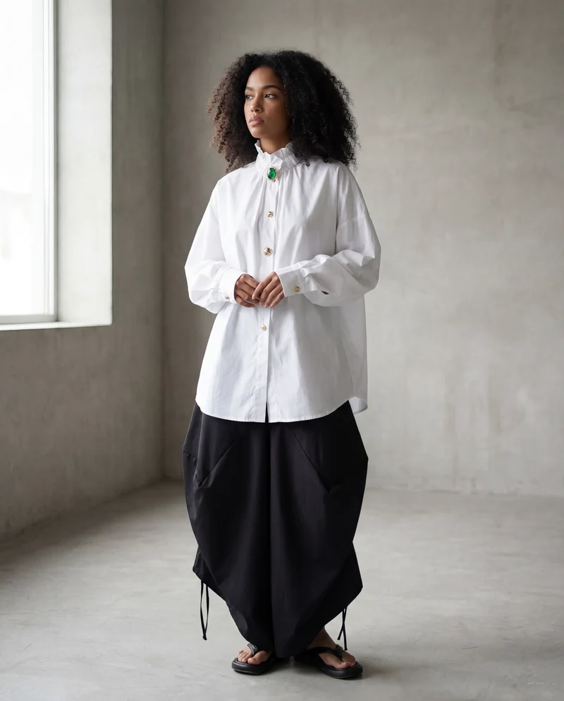 Ruffled Blouse with Decorative Buttons