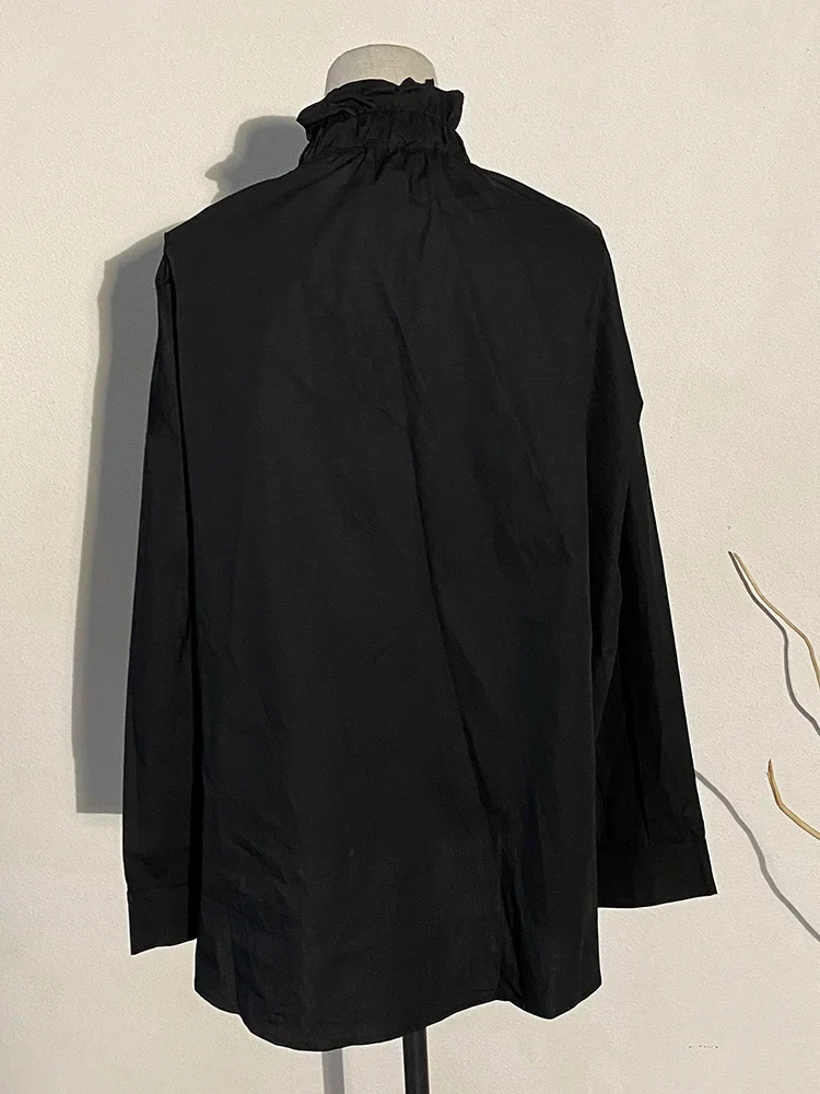 Ruffled Blouse with Decorative Buttons