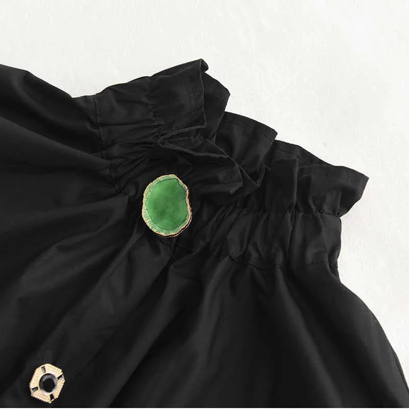 Ruffled Blouse with Decorative Buttons