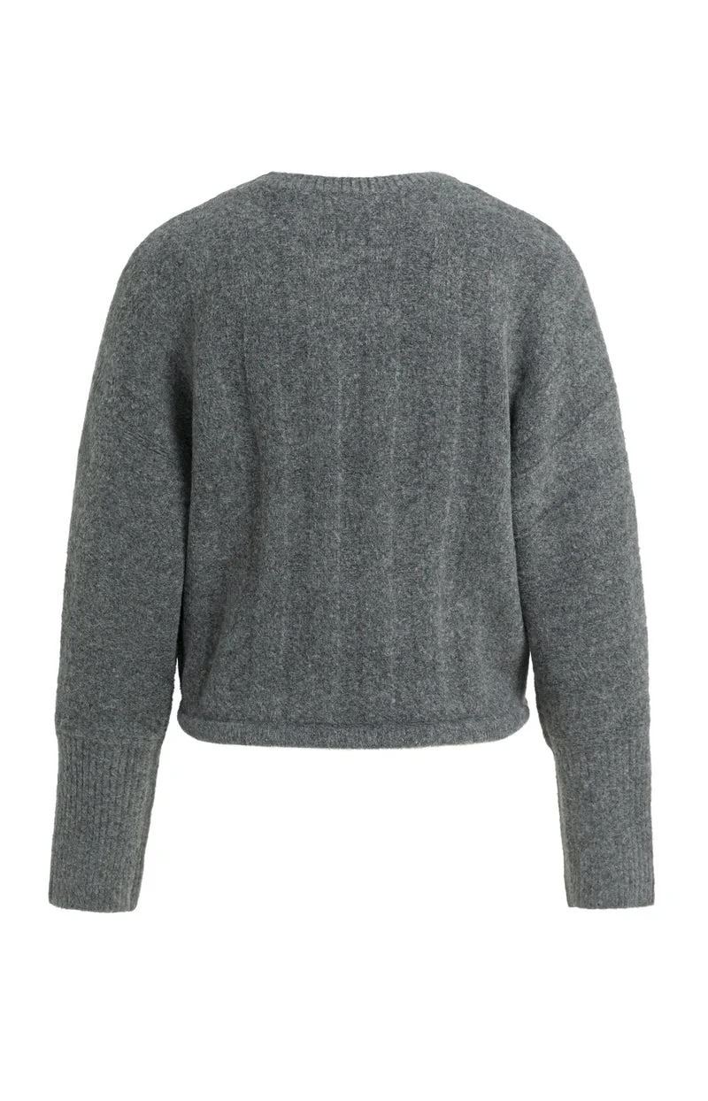 Pull ample à ourlet ajustable