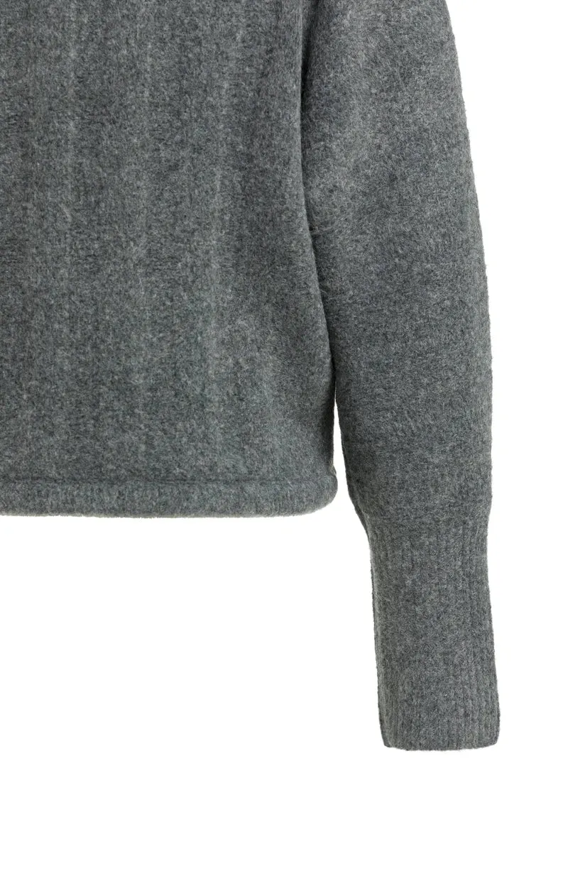 Pull ample à ourlet ajustable