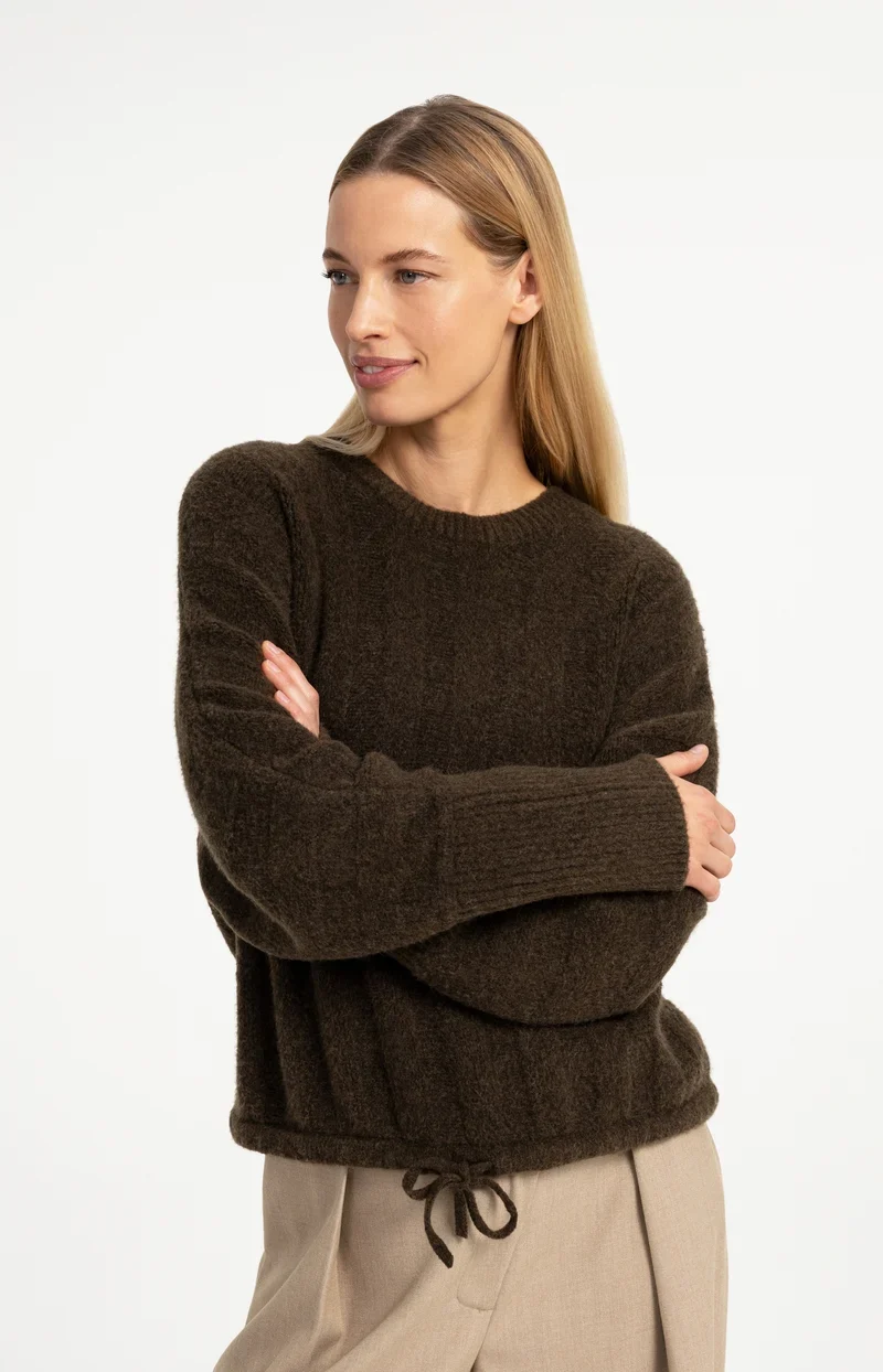 Pull ample à ourlet ajustable