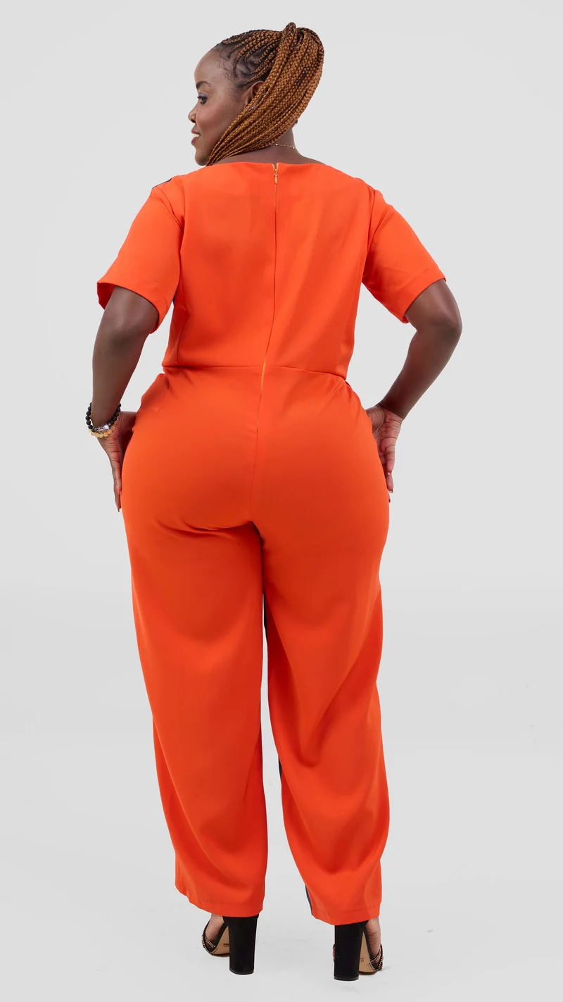 ZOSA Sunset Muse Jumpsuit ,bold orange and teal colorblock design.