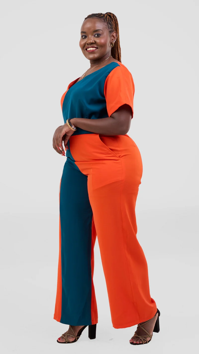 ZOSA Sunset Muse Jumpsuit ,bold orange and teal colorblock design.