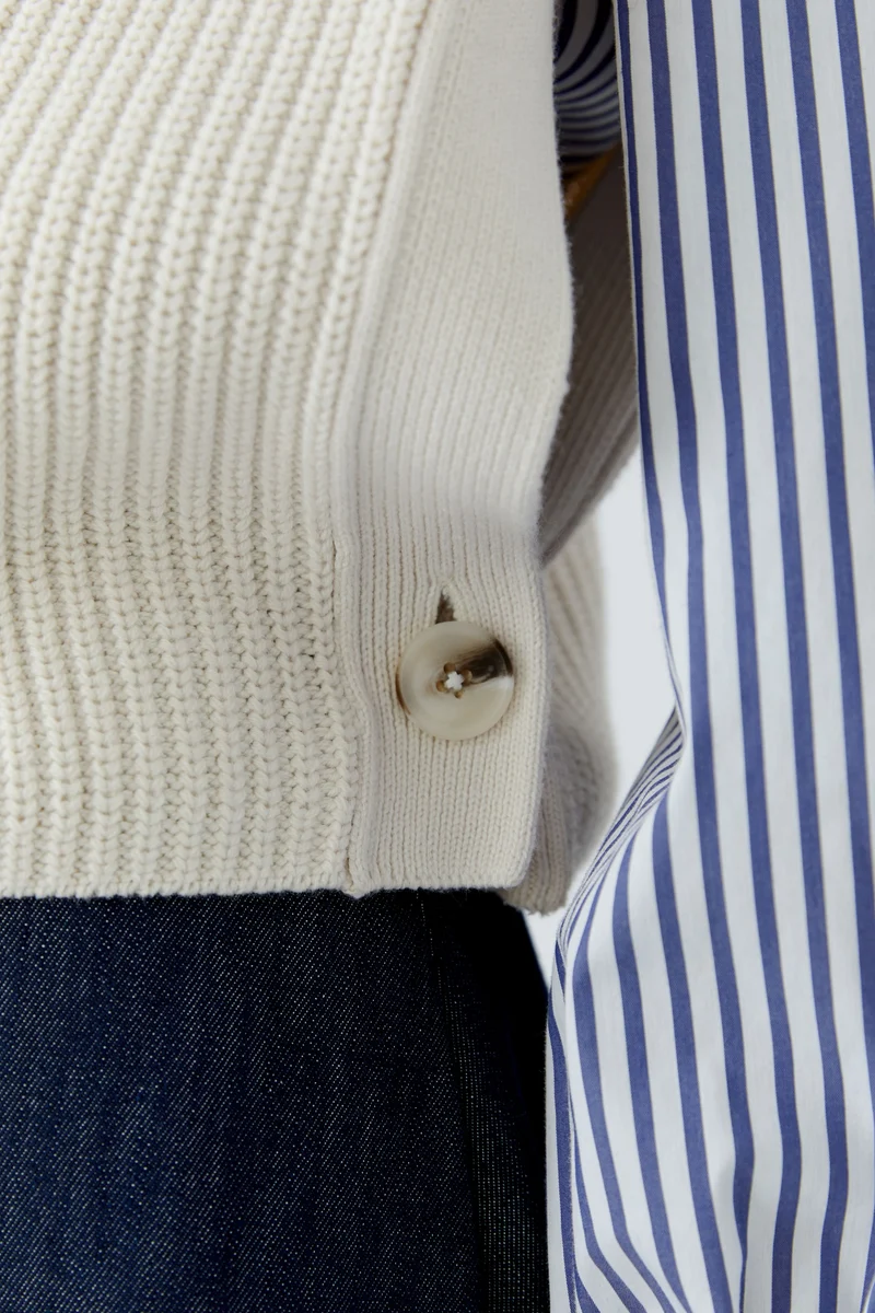 Pull sans manches à col demi-zippé