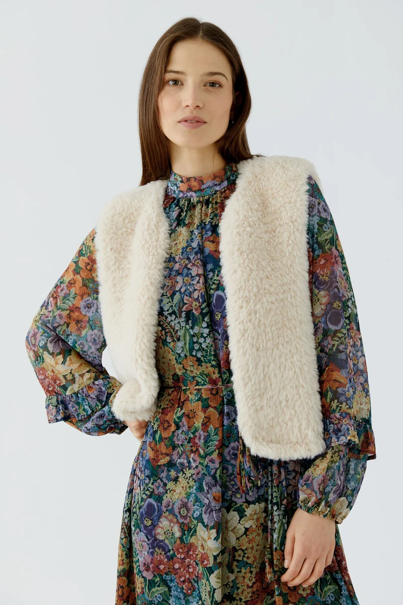 Veste courte sans manches à texture pelucheuse