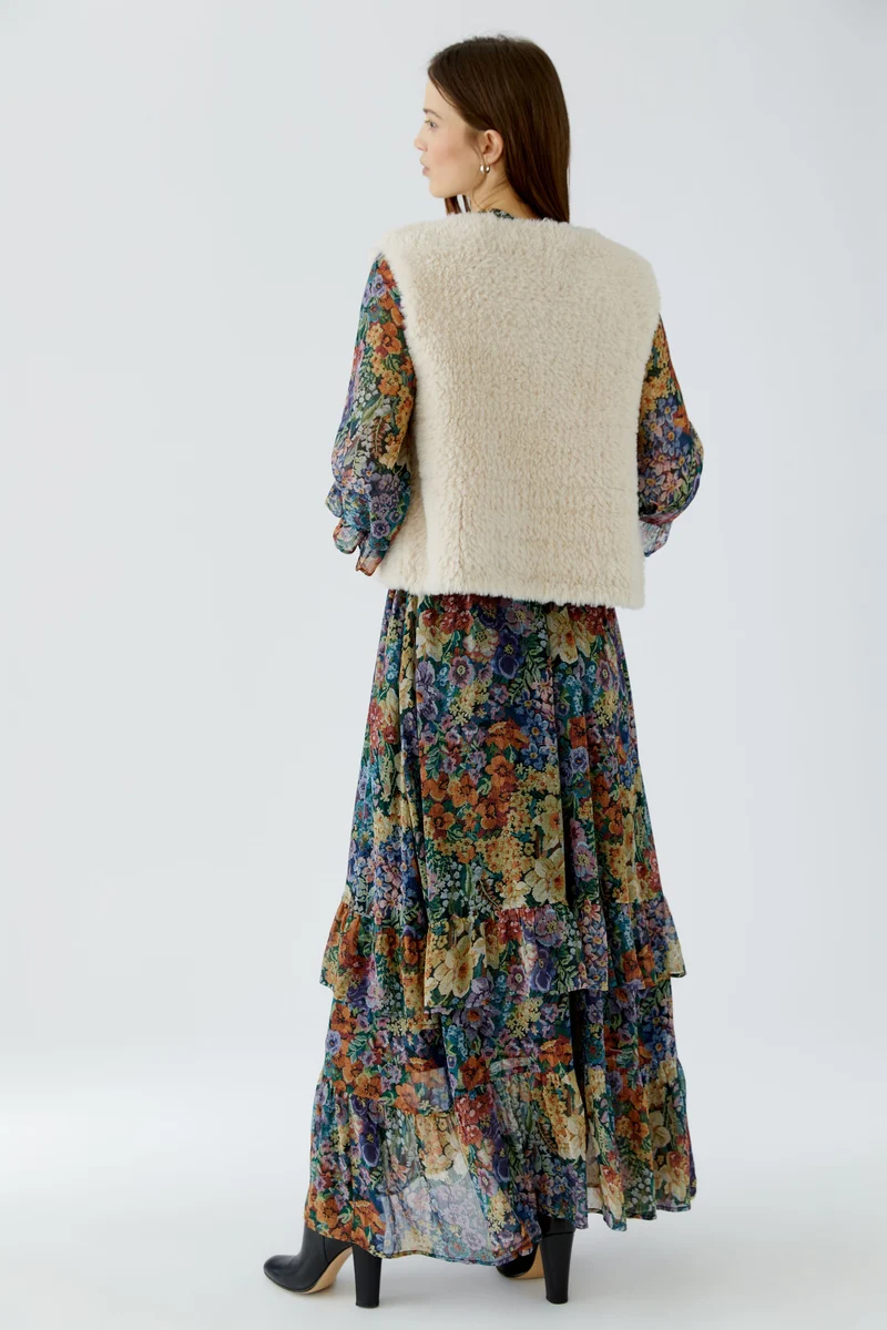 Veste courte sans manches à texture pelucheuse