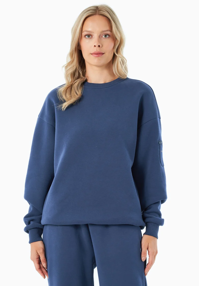 SAYLORR | Essentials Travel Unisex Sweatshirt aus Bio-Baumwolle und recyceltem Polyester