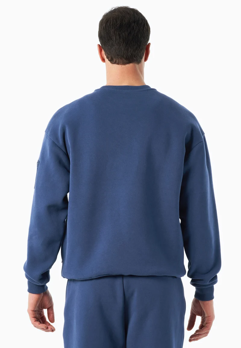 SAYLORR | Essentials Travel Unisex Sweatshirt aus Bio-Baumwolle und recyceltem Polyester