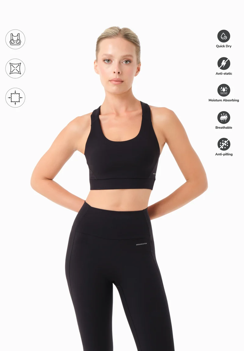 BEVINN | Cross-Strap Sport Bralette aus recyceltem Polyamid