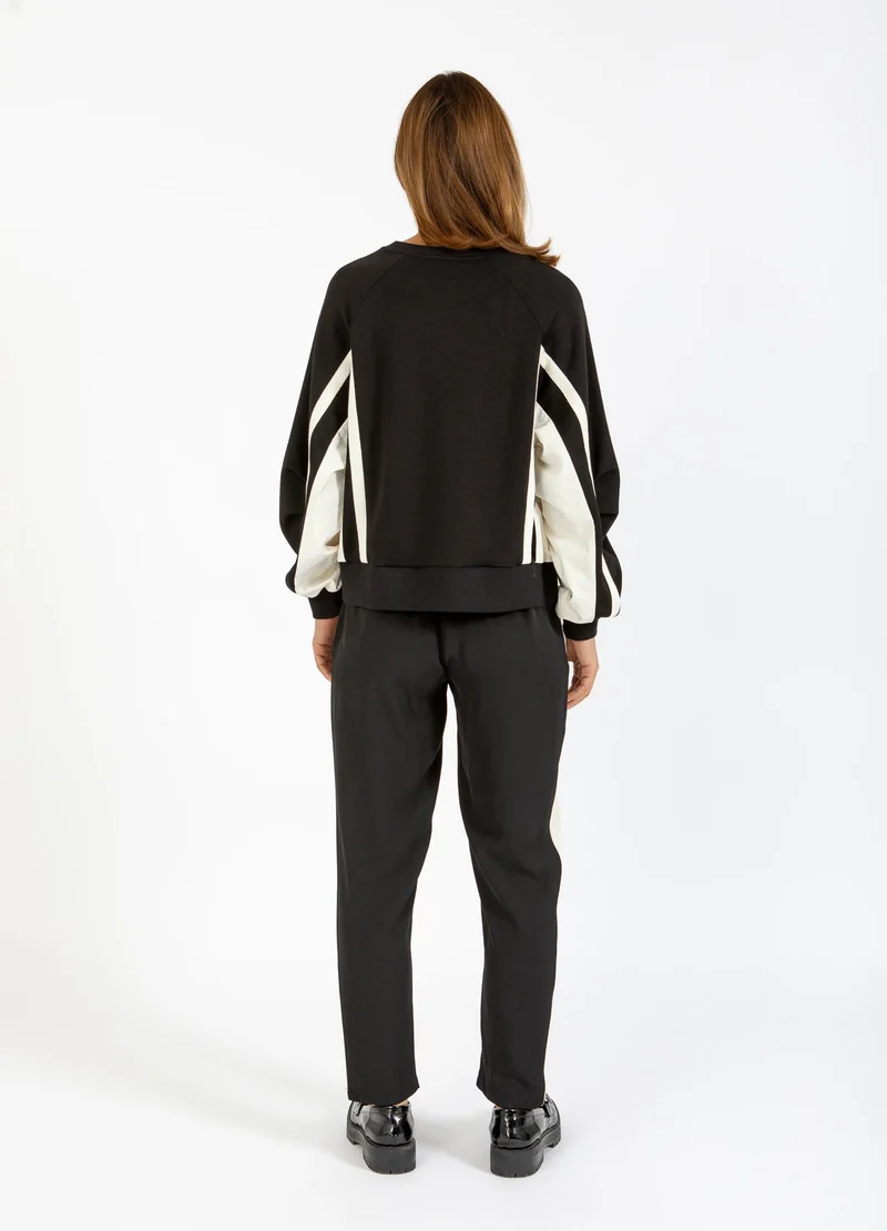 Jogging style sportif avec bandes latérales