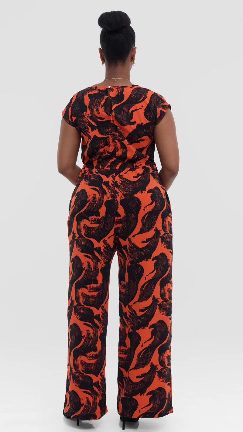 Vivo Sakari Drop Shoulder Jumpsuit in Crepe - Orange / Black Print