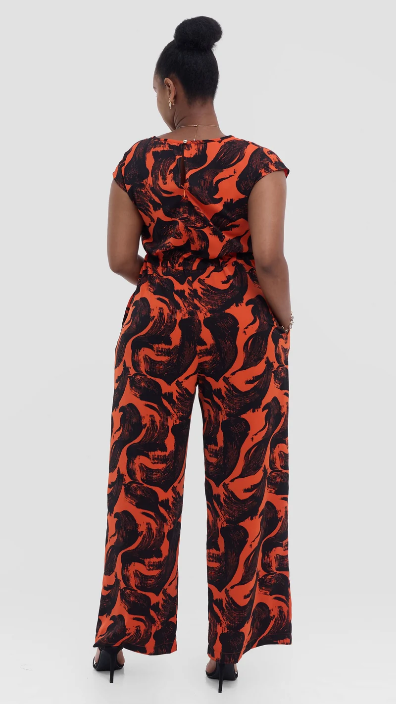 Vivo Sakari Drop Shoulder Jumpsuit in Crepe - Orange / Black Print