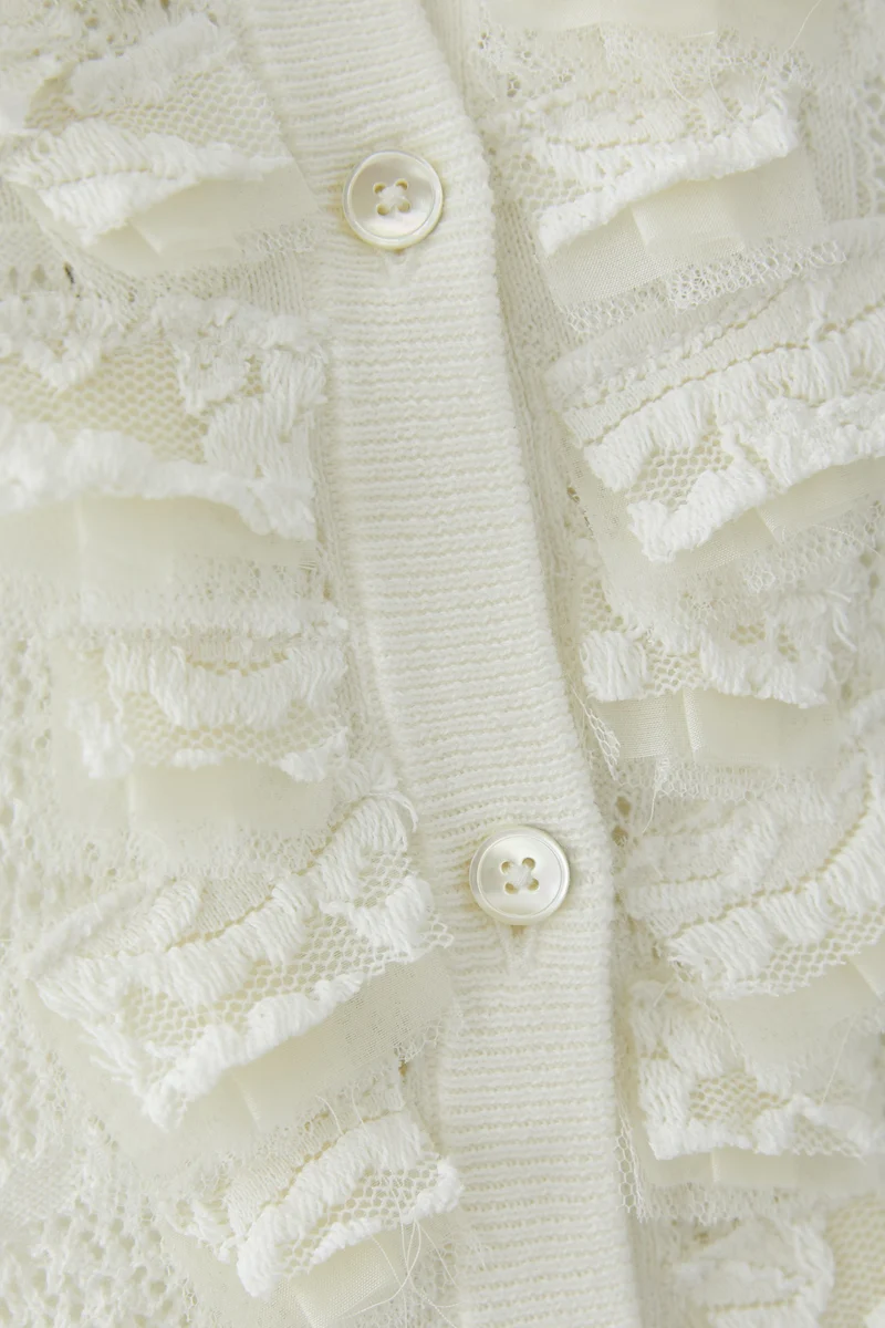 Cardigan en maille à volants délicats
