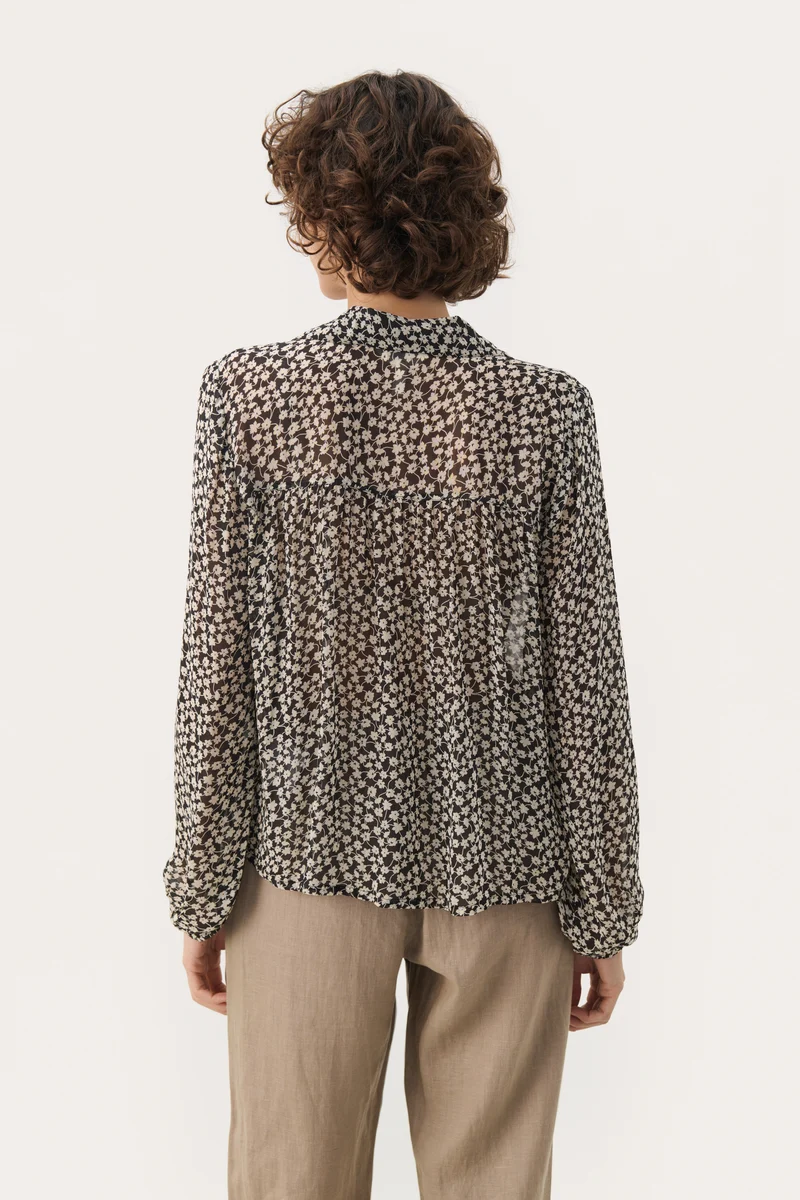 Blouse avec motif floral et col polo ouvert Nicholina