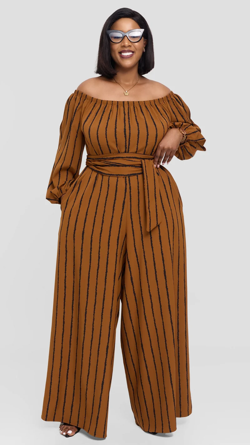 Vivo Yumi Off Shoulder Jumpsuit In Crepe - Rust / Black Print