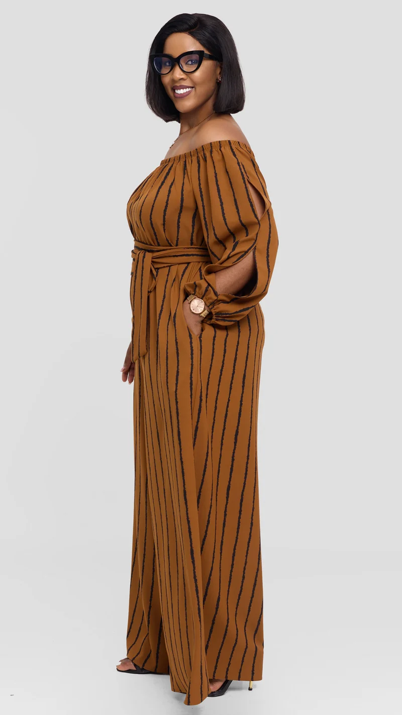 Vivo Yumi Off Shoulder Jumpsuit In Crepe - Rust / Black Print