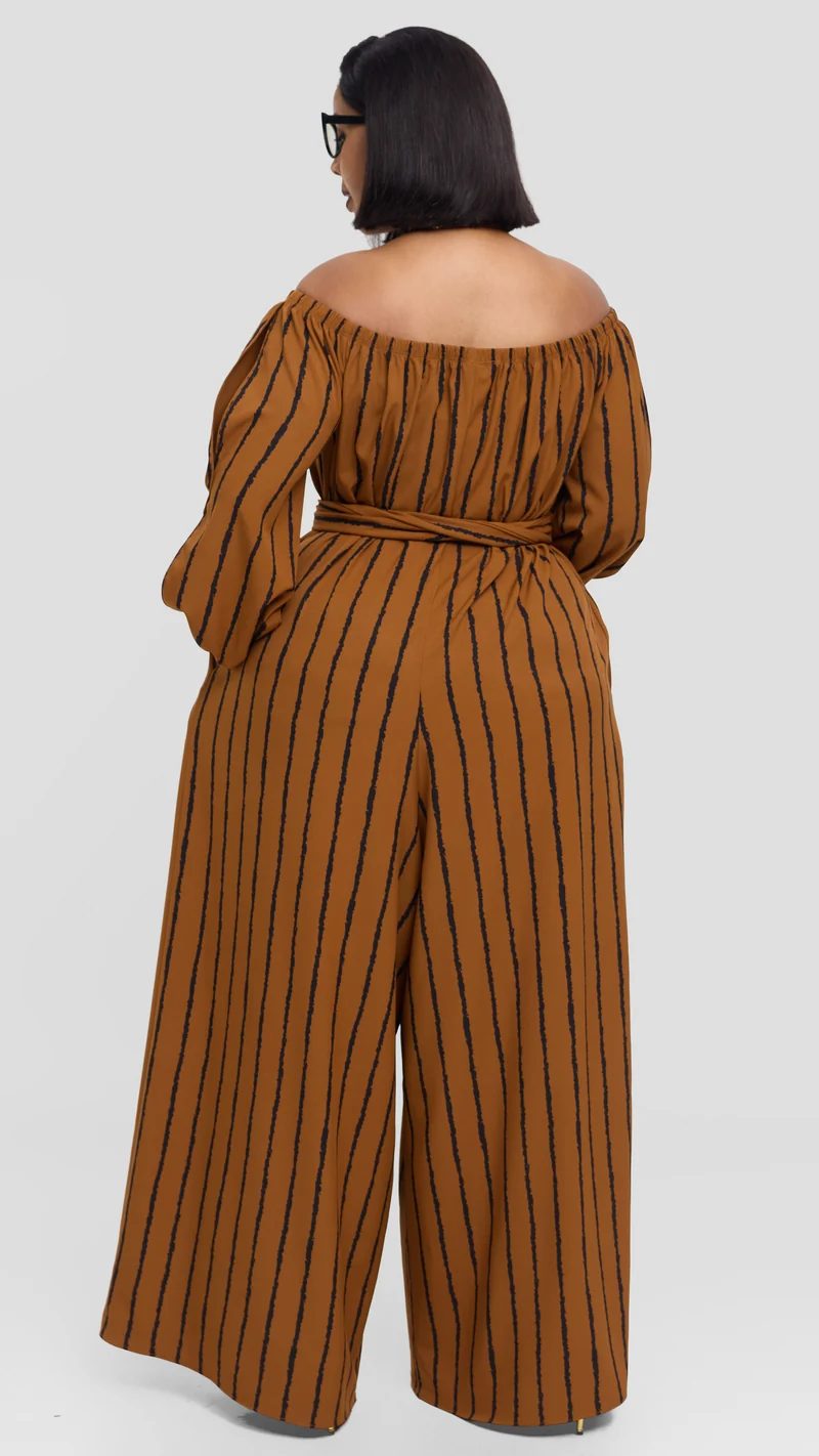 Vivo Yumi Off Shoulder Jumpsuit In Crepe - Rust / Black Print