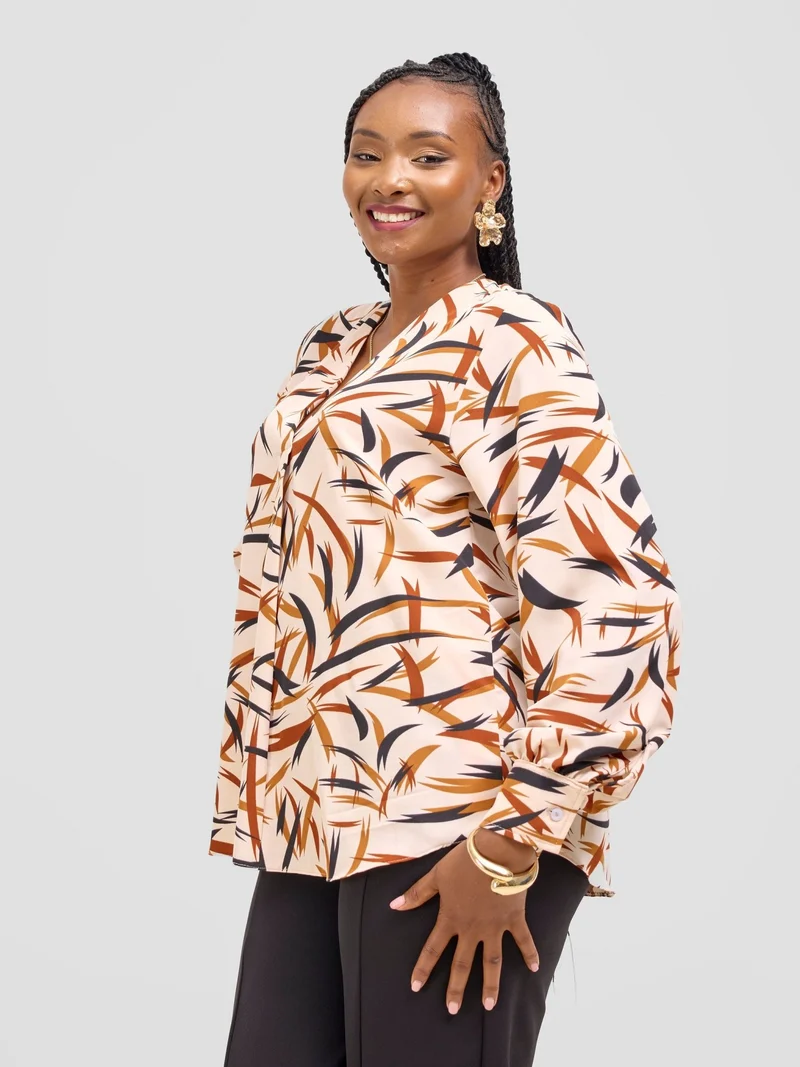 Vivo Ajani V-Neck Top in Crepe - Cream / Rust Print