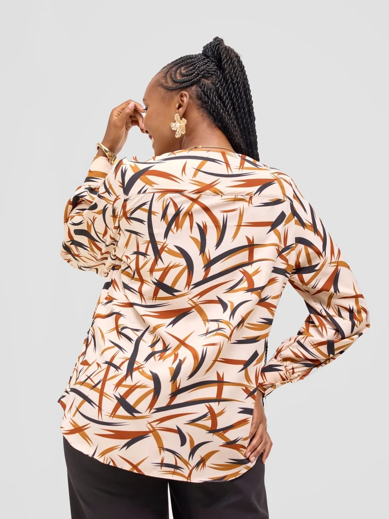 Vivo Ajani V-Neck Top in Crepe - Cream / Rust Print