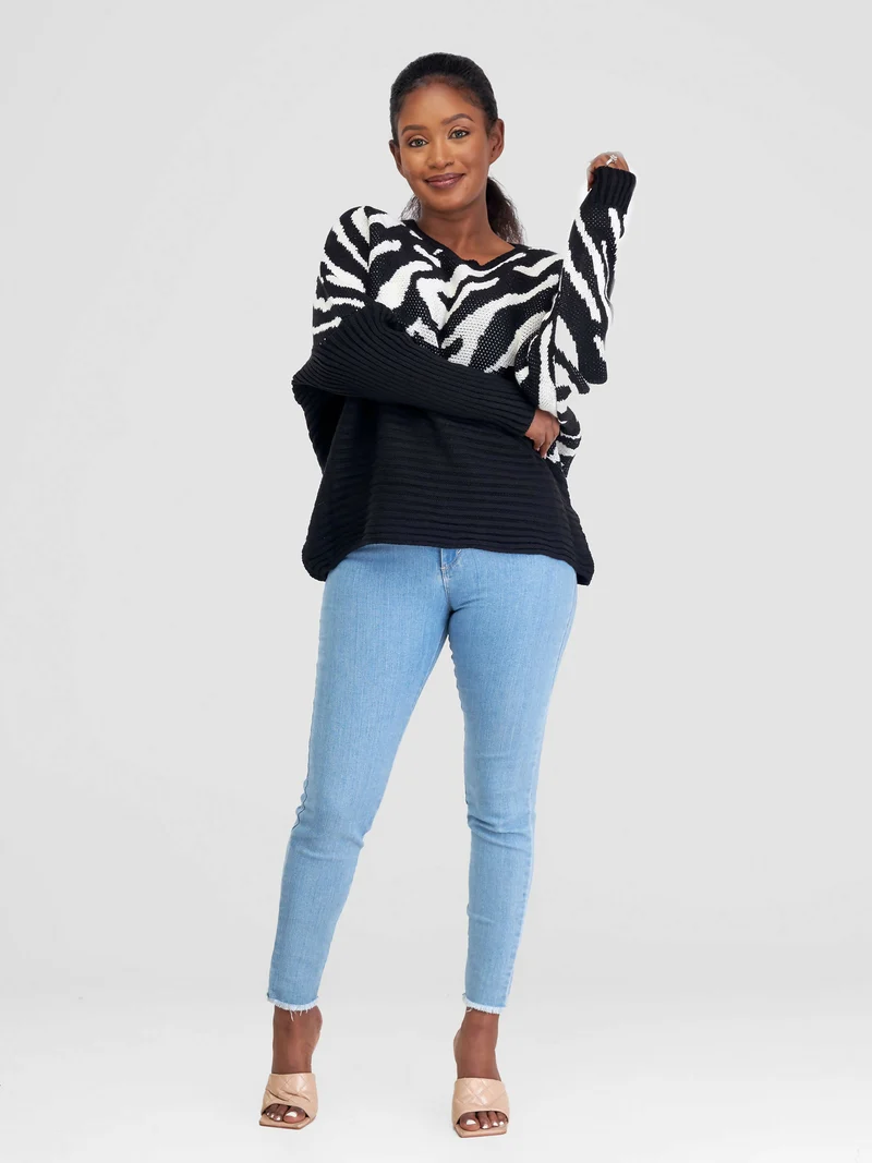 The Fashion Frenzy Zebra Print Sweater Top - Black