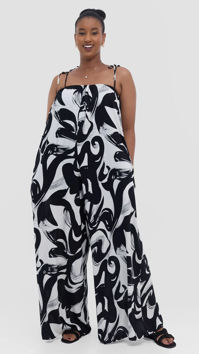 Vivo Maisha Strappy Cover Up Jumpsuit In Rayon - Black / Off White Print
