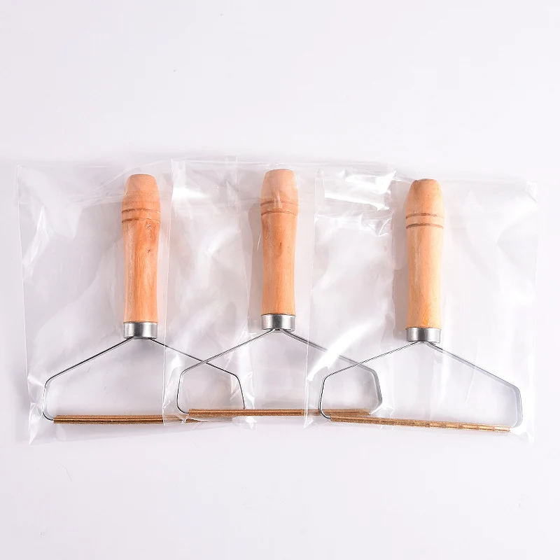 Wooden-Handle Lint Scraper