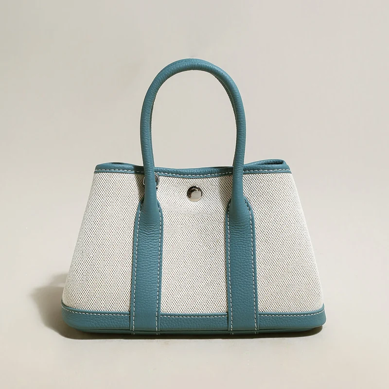 Carefree Canvas and Leather Top Handle Bag