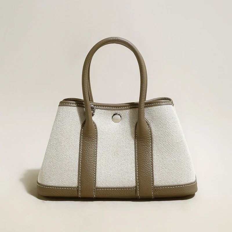Carefree Canvas and Leather Top Handle Bag