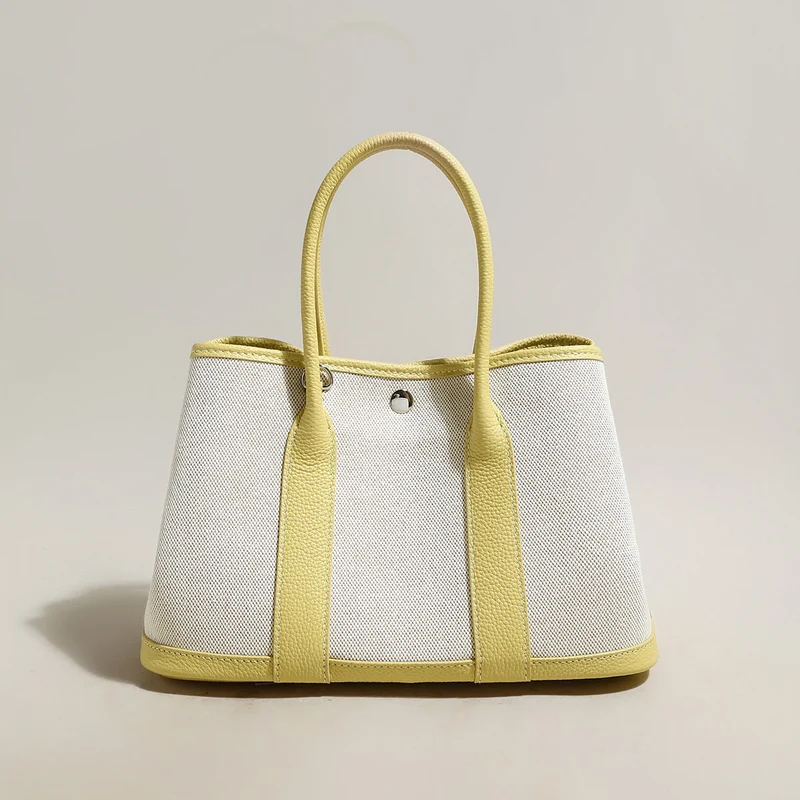 Carefree Canvas and Leather Top Handle Bag