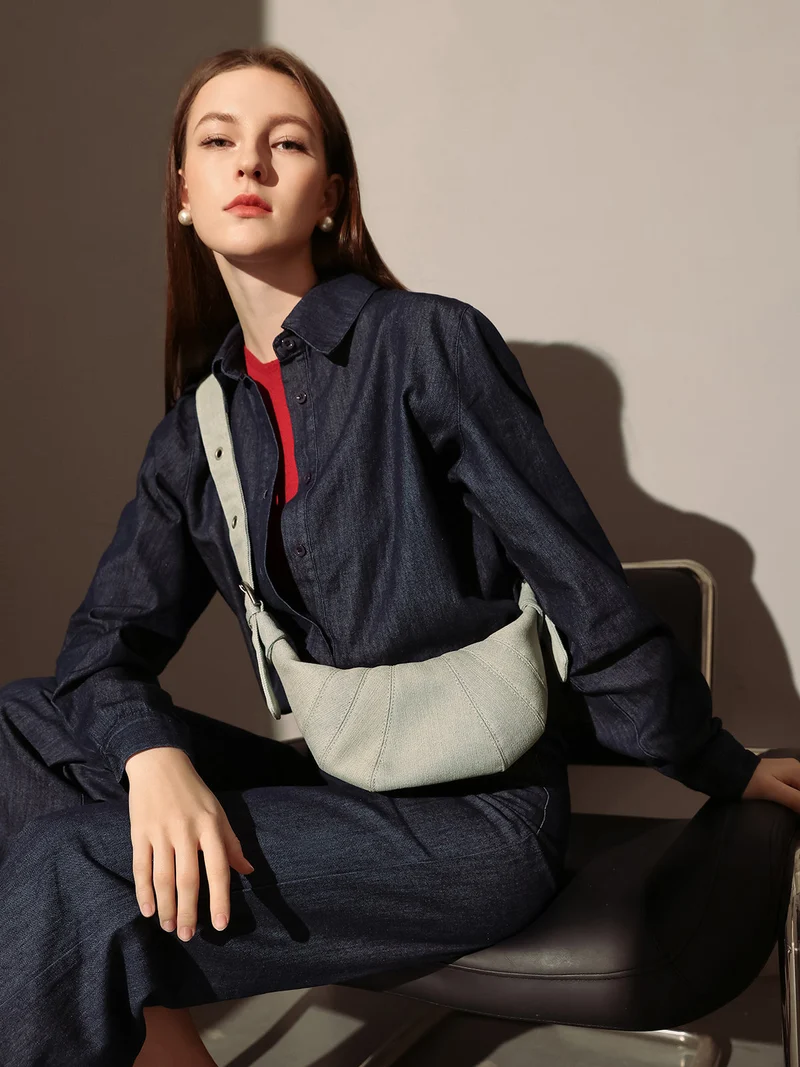 Understated Denim Croissant Mini Shoulder Bag