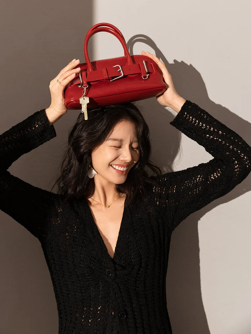 Baguette Belted Clasp Top Handle Bag